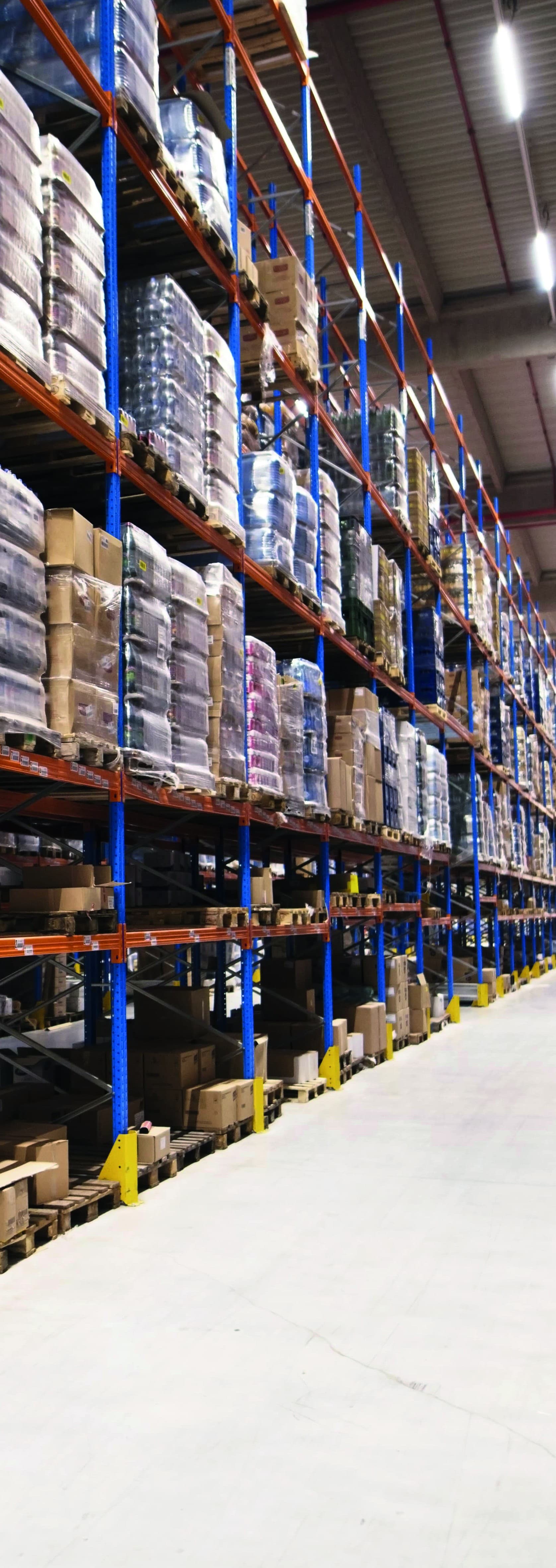 Rows of stocked warehouse racking at a Gravan supply facility.